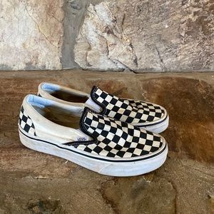 Checkered black and white vans